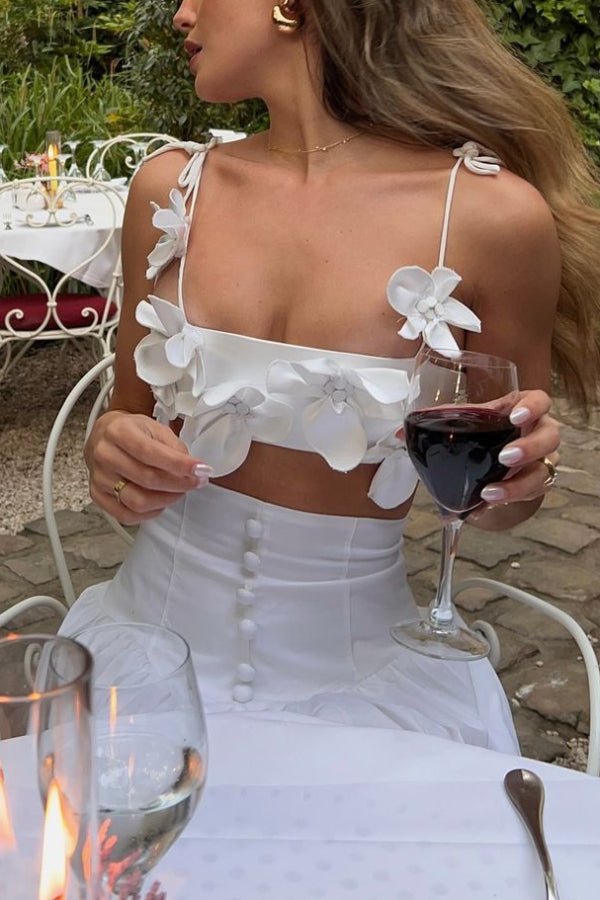 Flower embellished camisole top